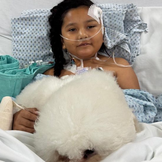 Child receiving oxygen therapy in a pediatric intensive care unit (PICU) for a severe respiratory infection.
